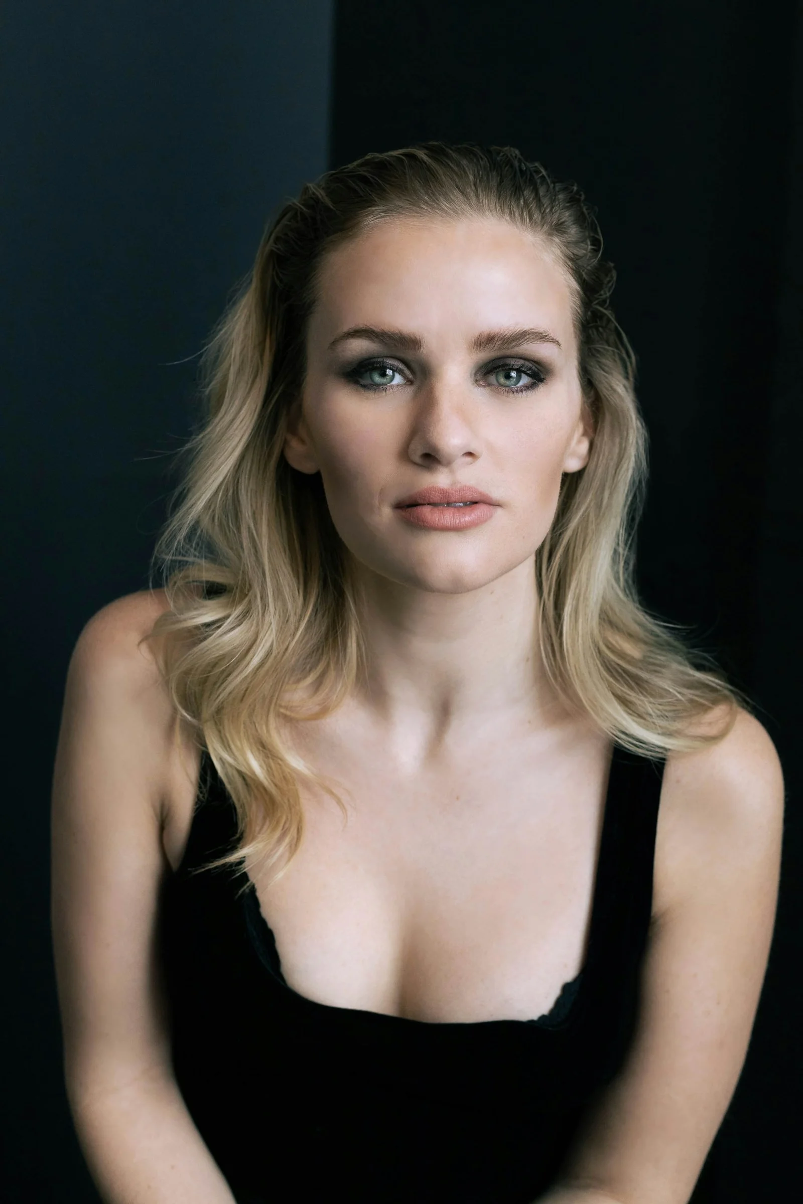woman in black tank top