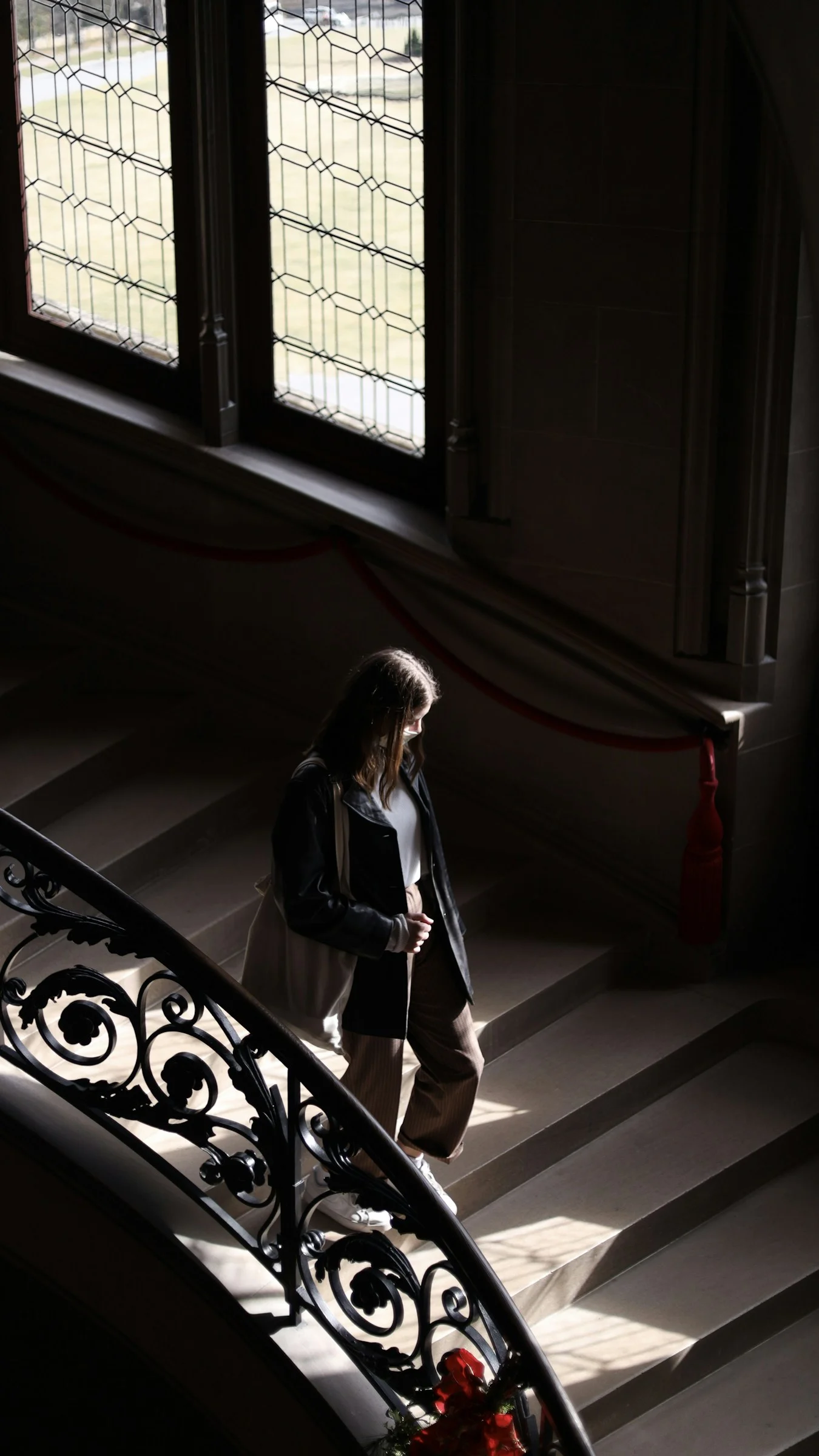 a person standing in front of a window
