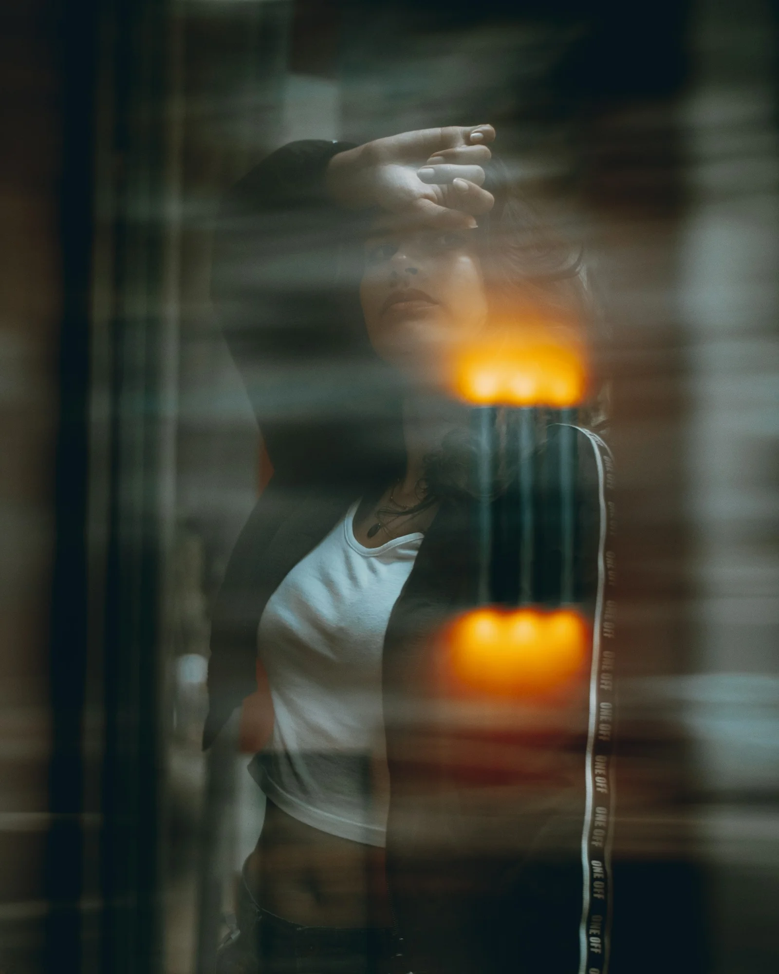 Woman is seen through a blurred, creative filter
