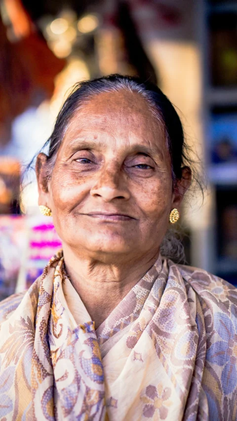 a woman with a scarf around her neck
