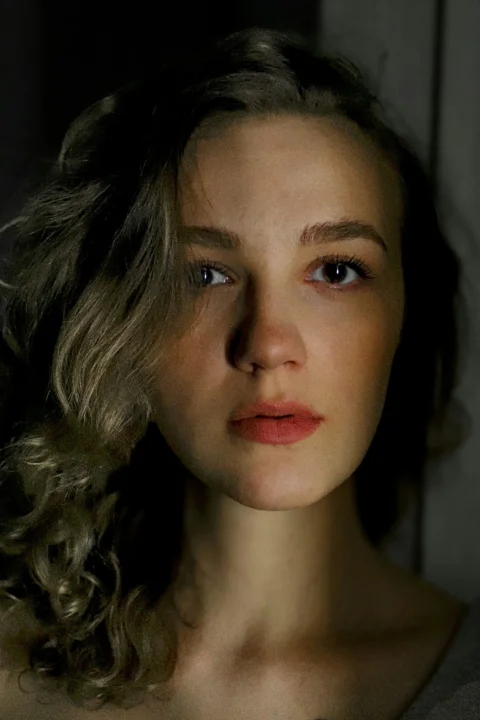 A close up of a person with long hair