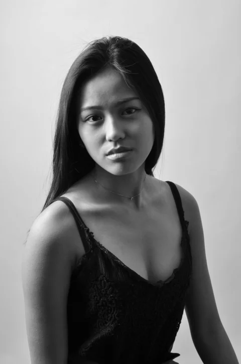 a black and white photo of a woman