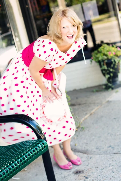 vintage woman, polka dot dress, laughing, attractive