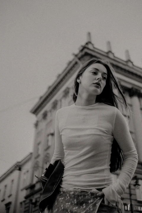 Young woman walking in a city street