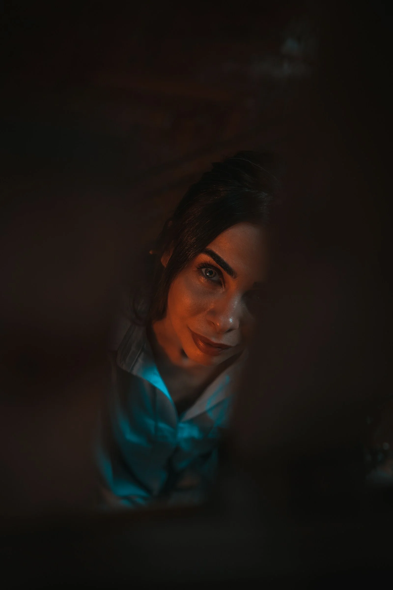 woman in blue and white collared shirt