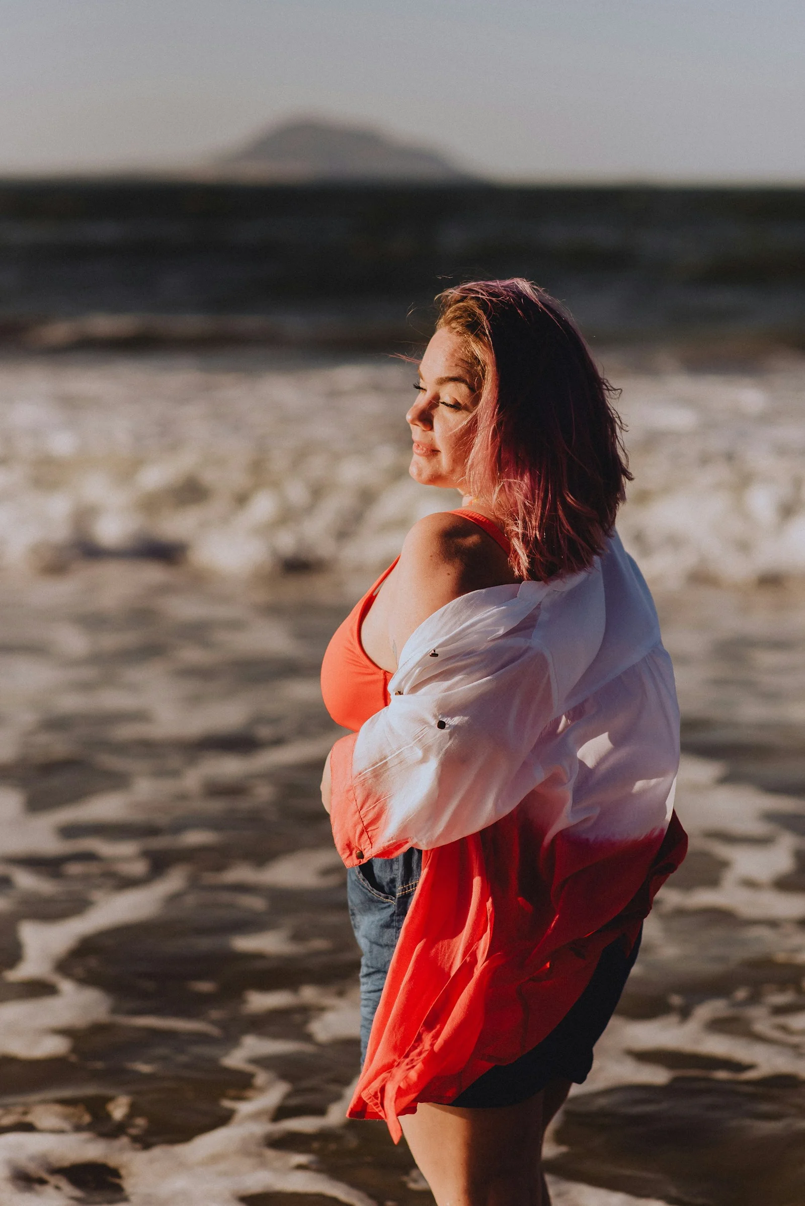 a person standing on a beach