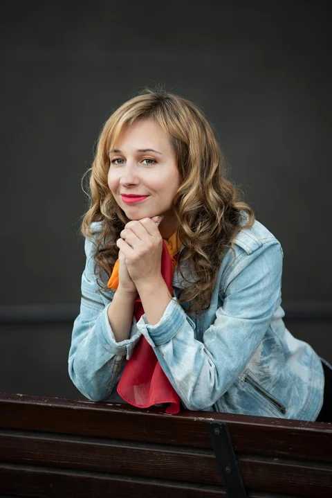woman, scarf, jean jacket, curly