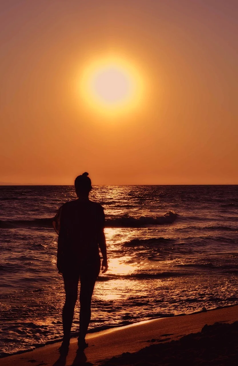 woman silhouette, seaside, seascape, orange
