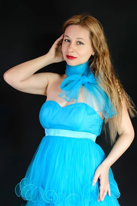 woman, blue dress, scarf, smile
