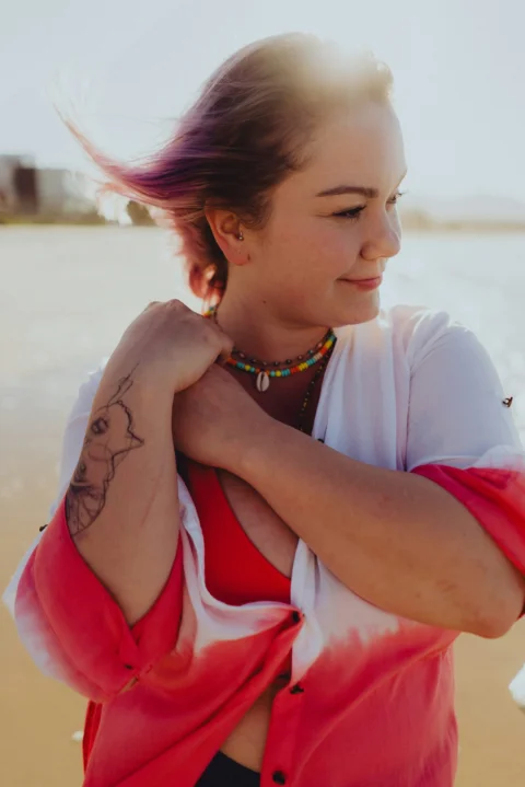 a woman with her arms crossed