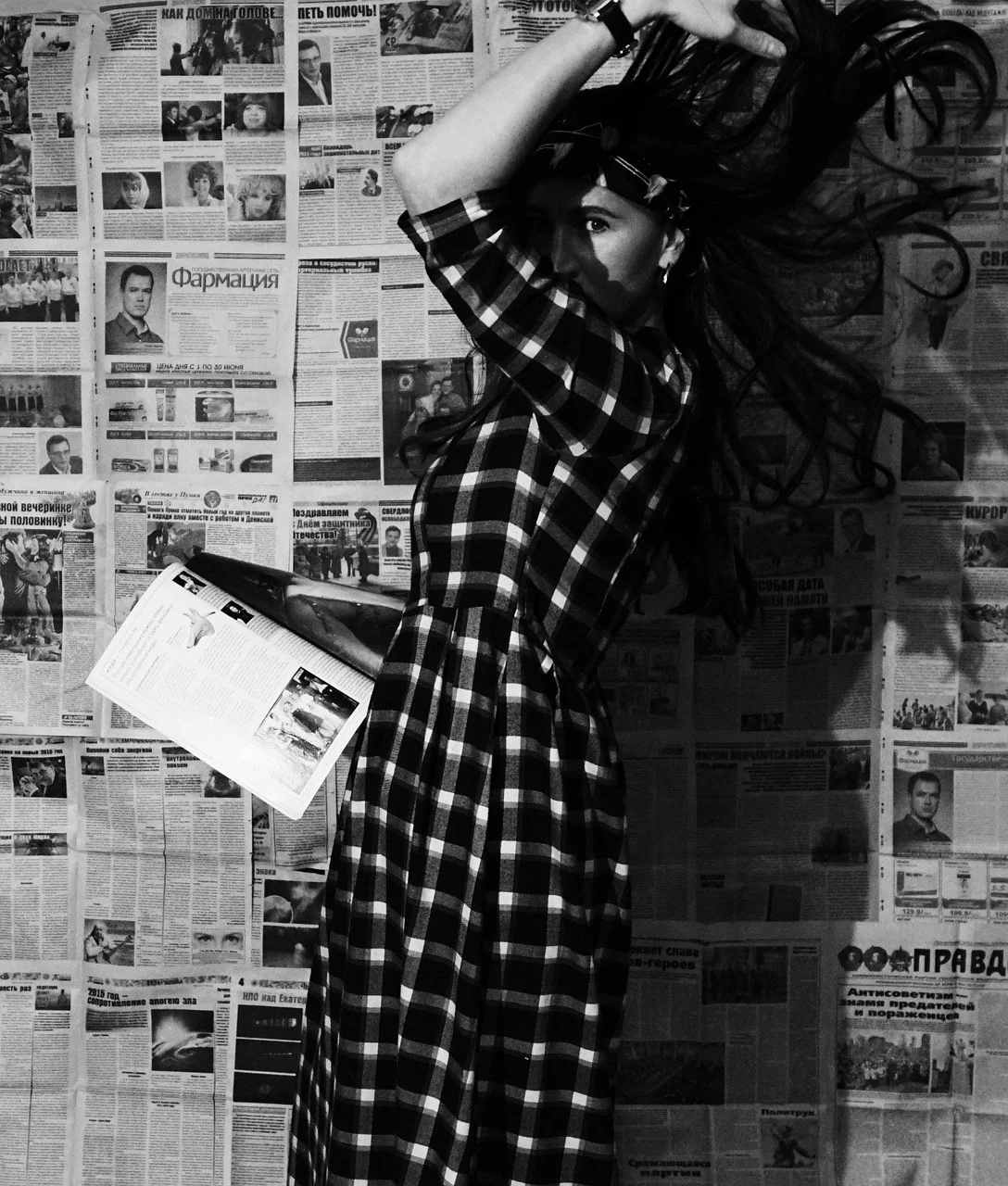 young woman, newspapers, portrait, brunette