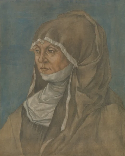 Older woman wearing a brown hood and white wimple