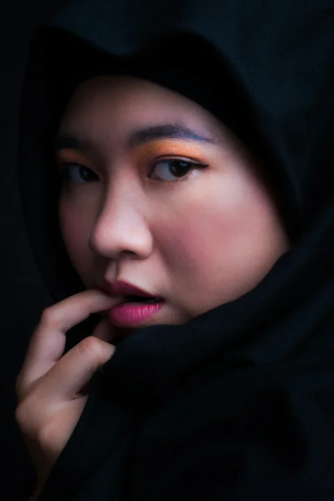 woman touching own lips