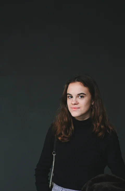 woman wearing black sweater