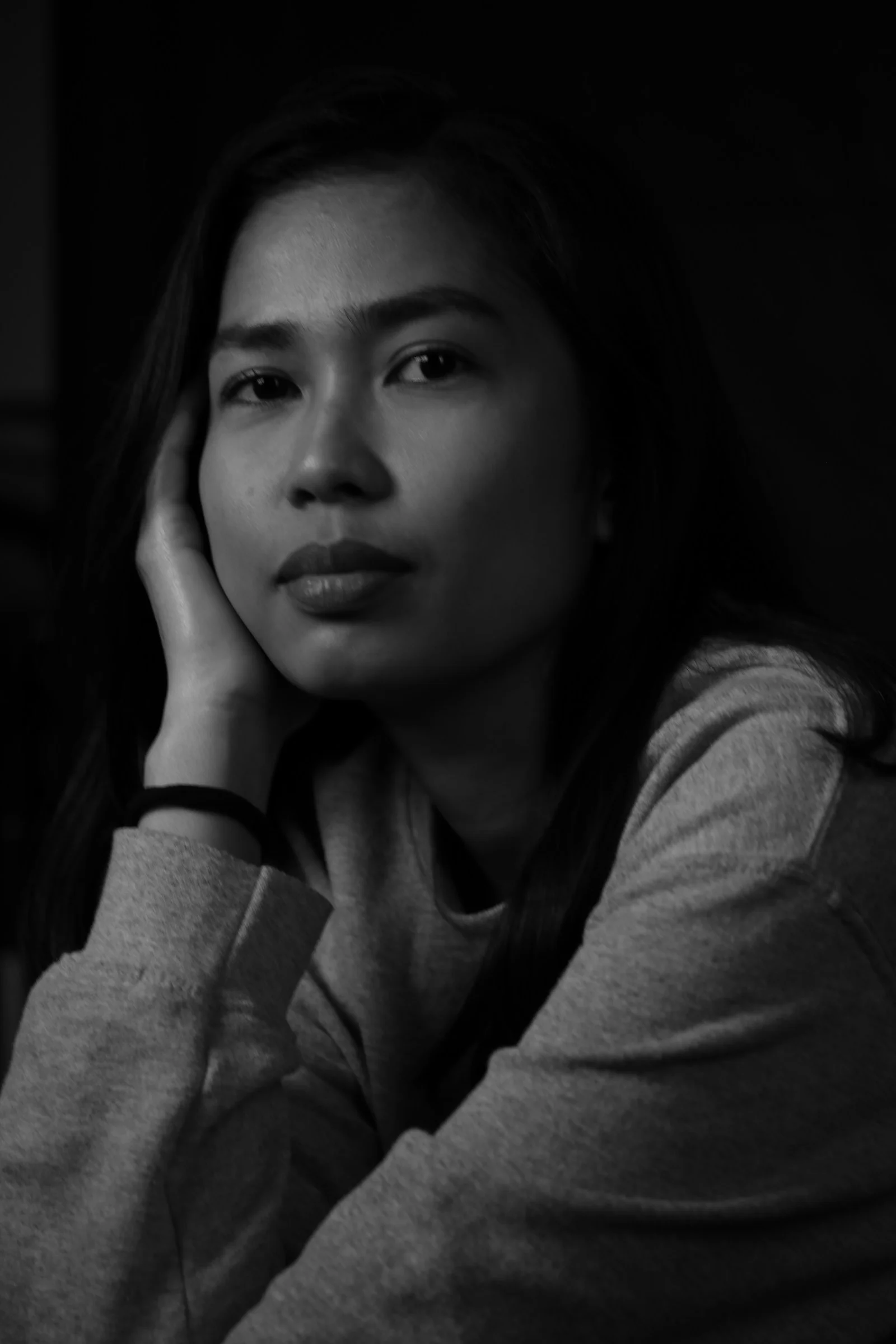 a black and white photo of a woman