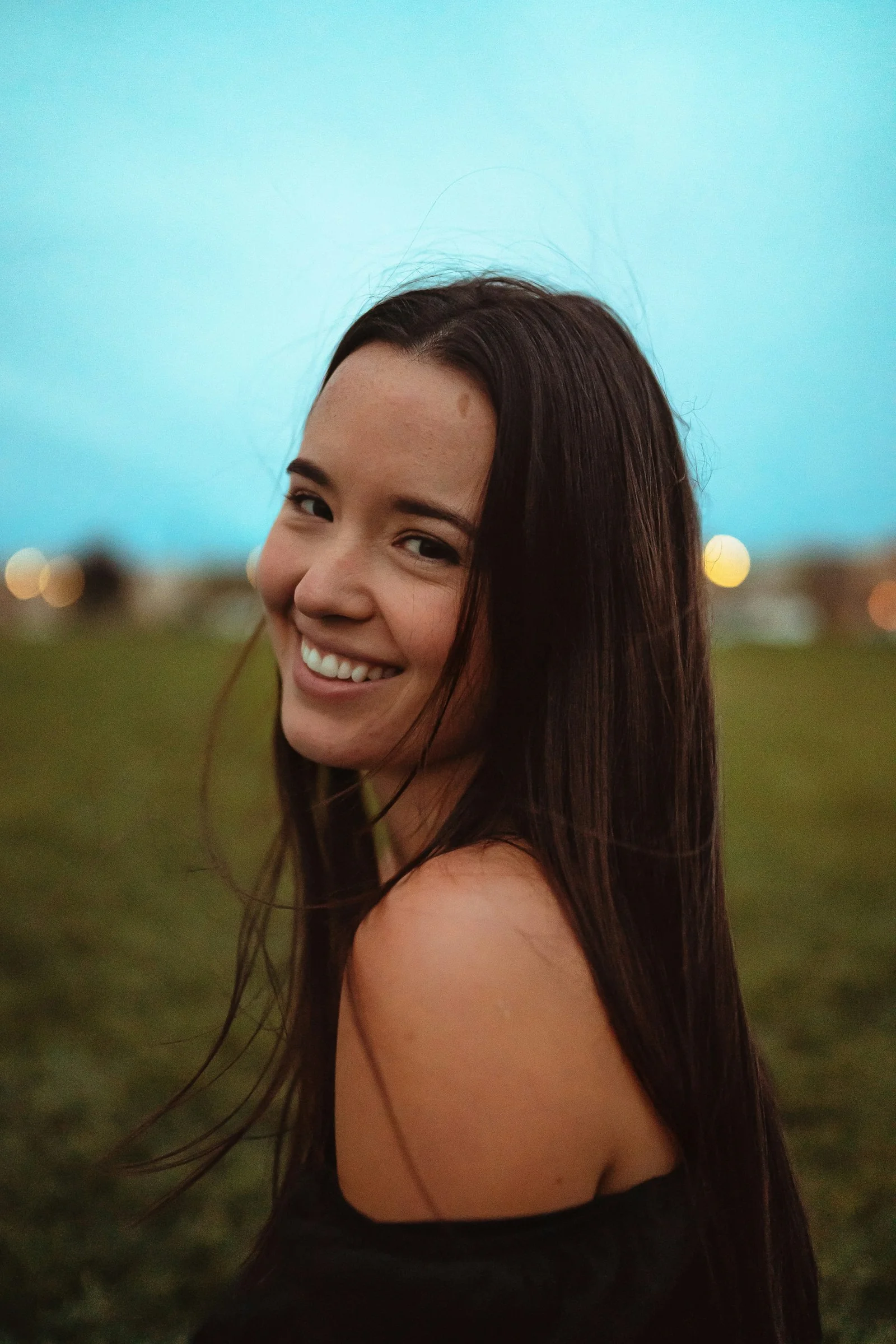 a woman smiling at the camera