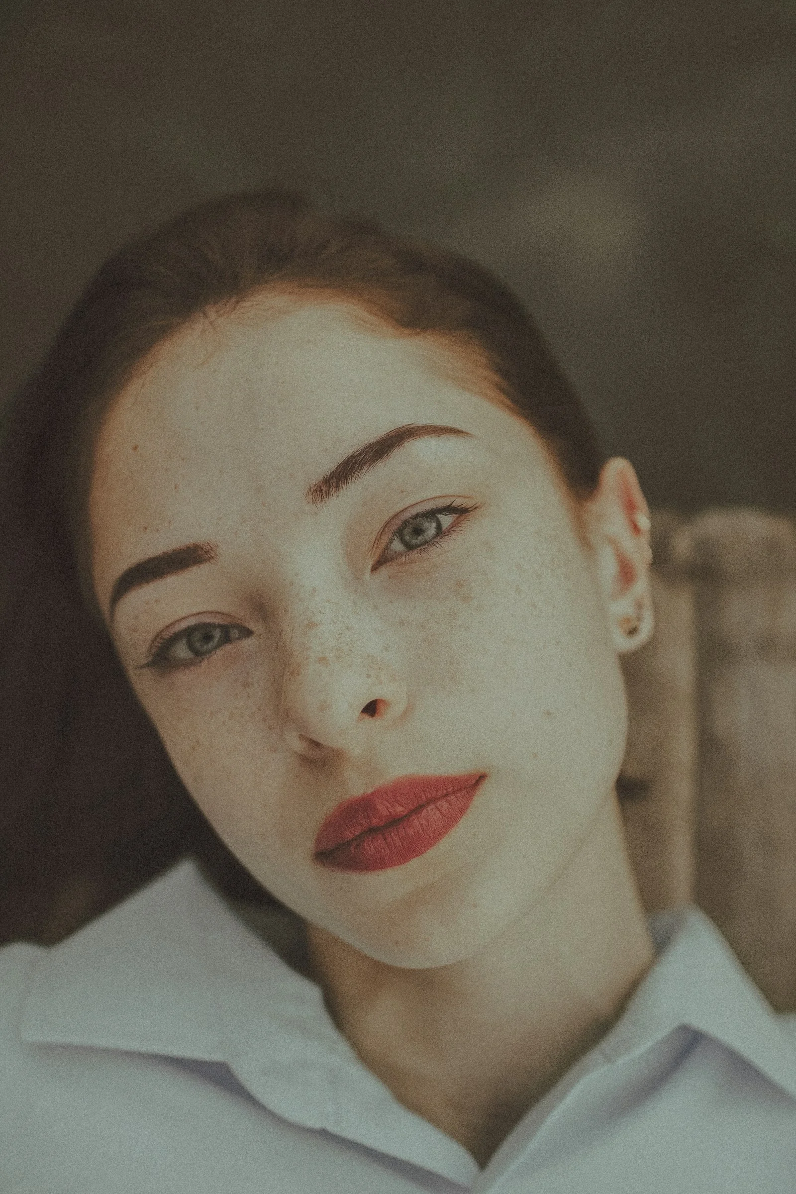 woman in white collared shirt