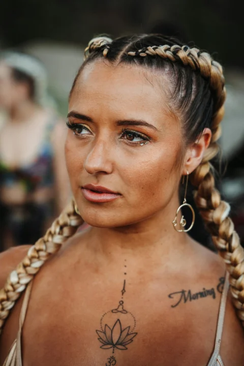 a woman with a tattoo on her back