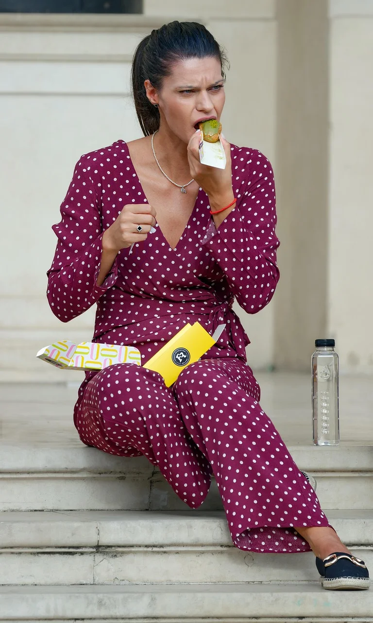 woman, young, eating, sitting
