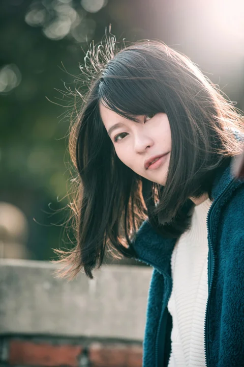 woman in blue and white sweater