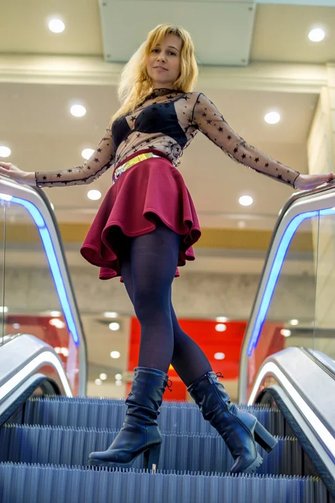 young woman, escalator, steps, skirt