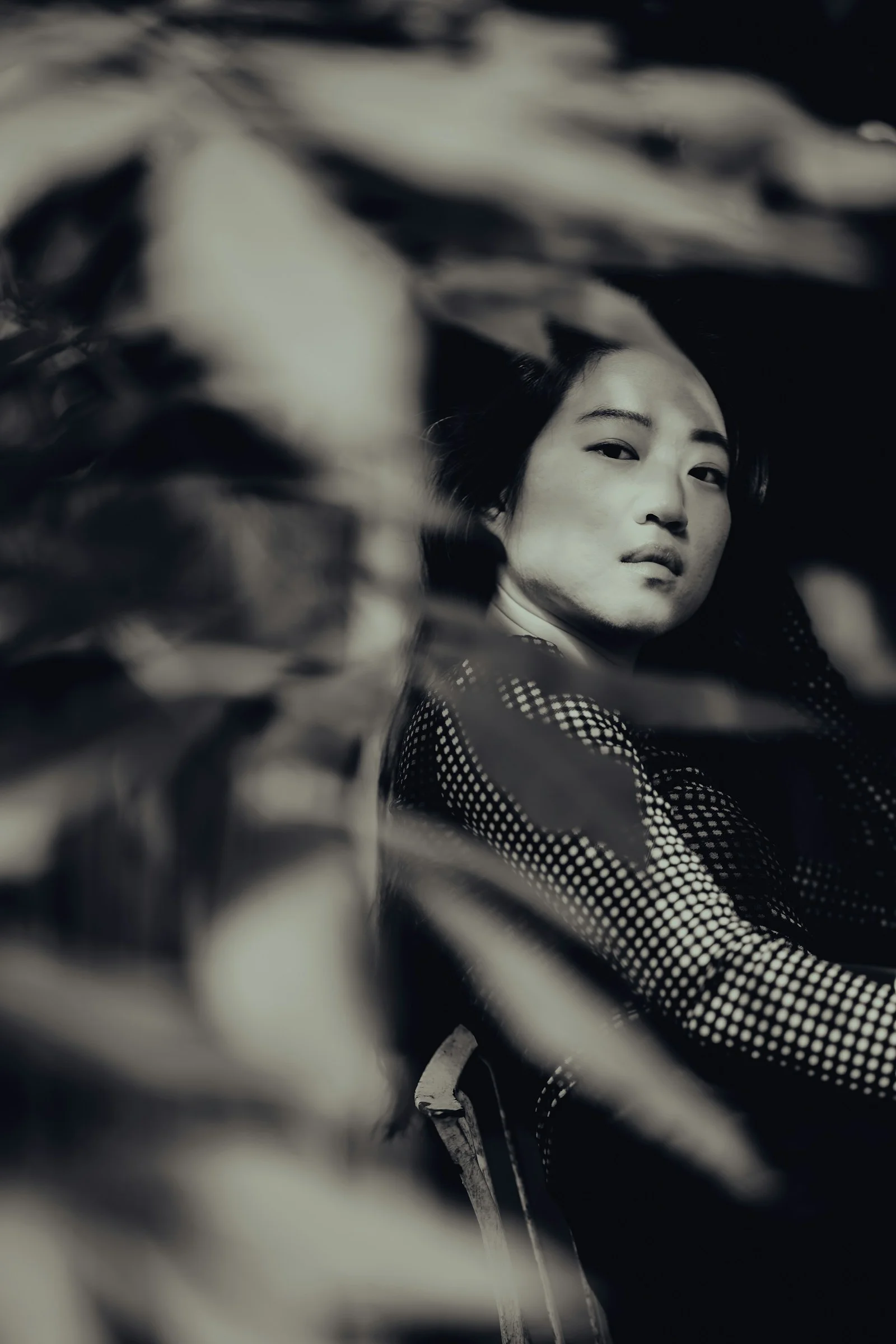 woman in black and white checkered shirt