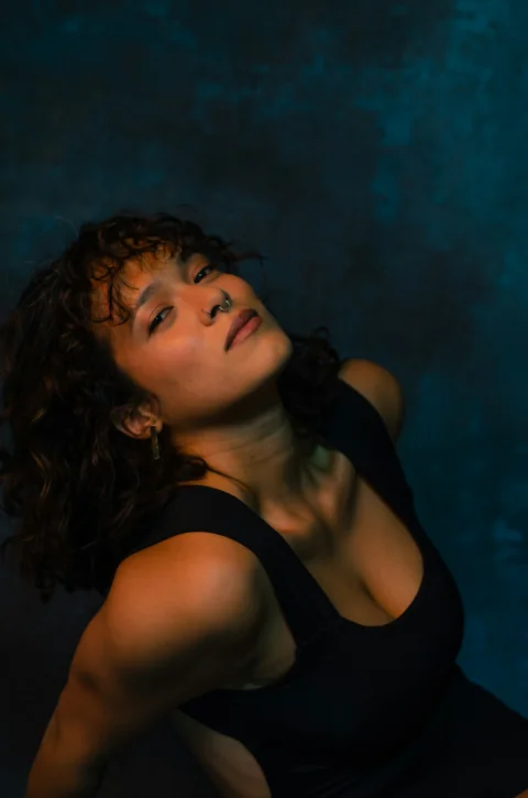 woman in black tank top