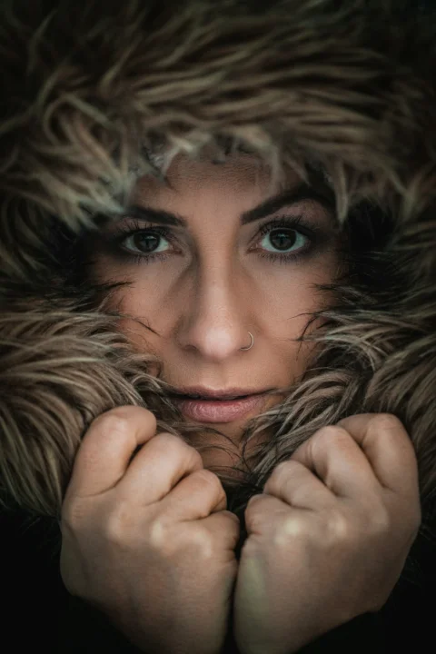woman with brown fur scarf