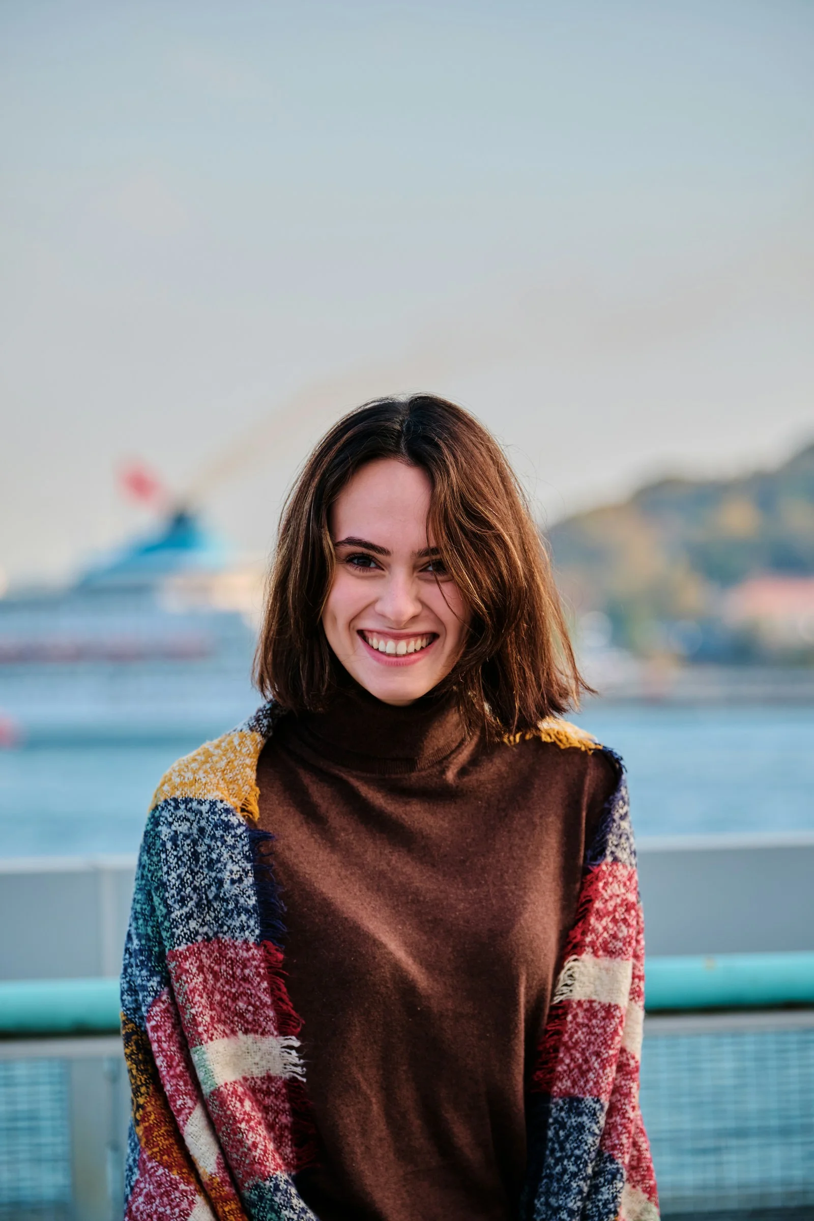 woman in brown scarf and brown scarf