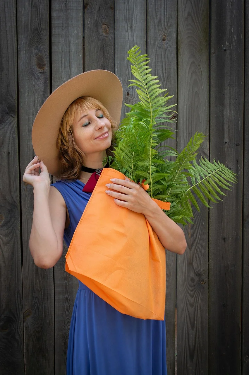 portrait, woman, fern, a bag