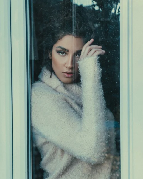 woman in white fur coat