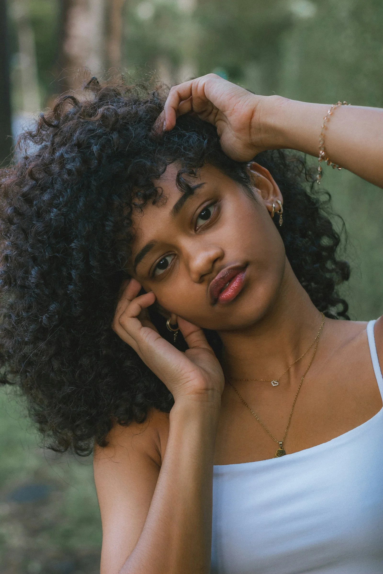 a woman with curly hair