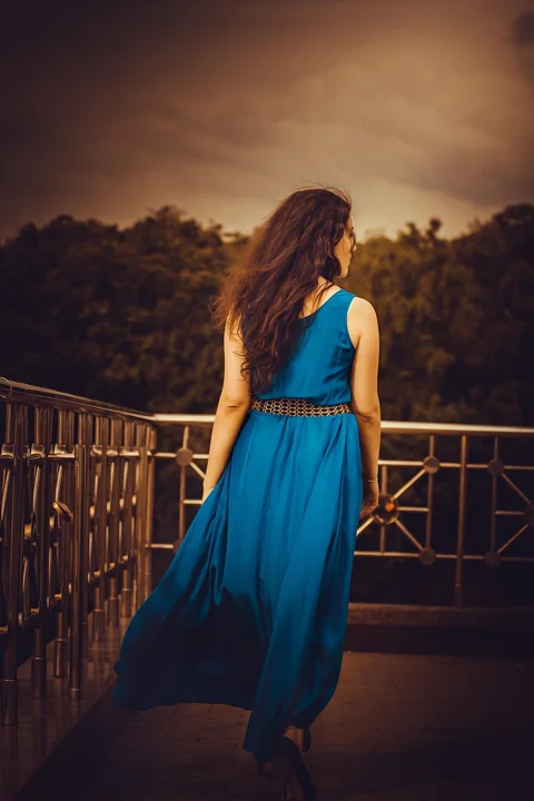 girl in a long dress from the back, blue, hands, gorgeous