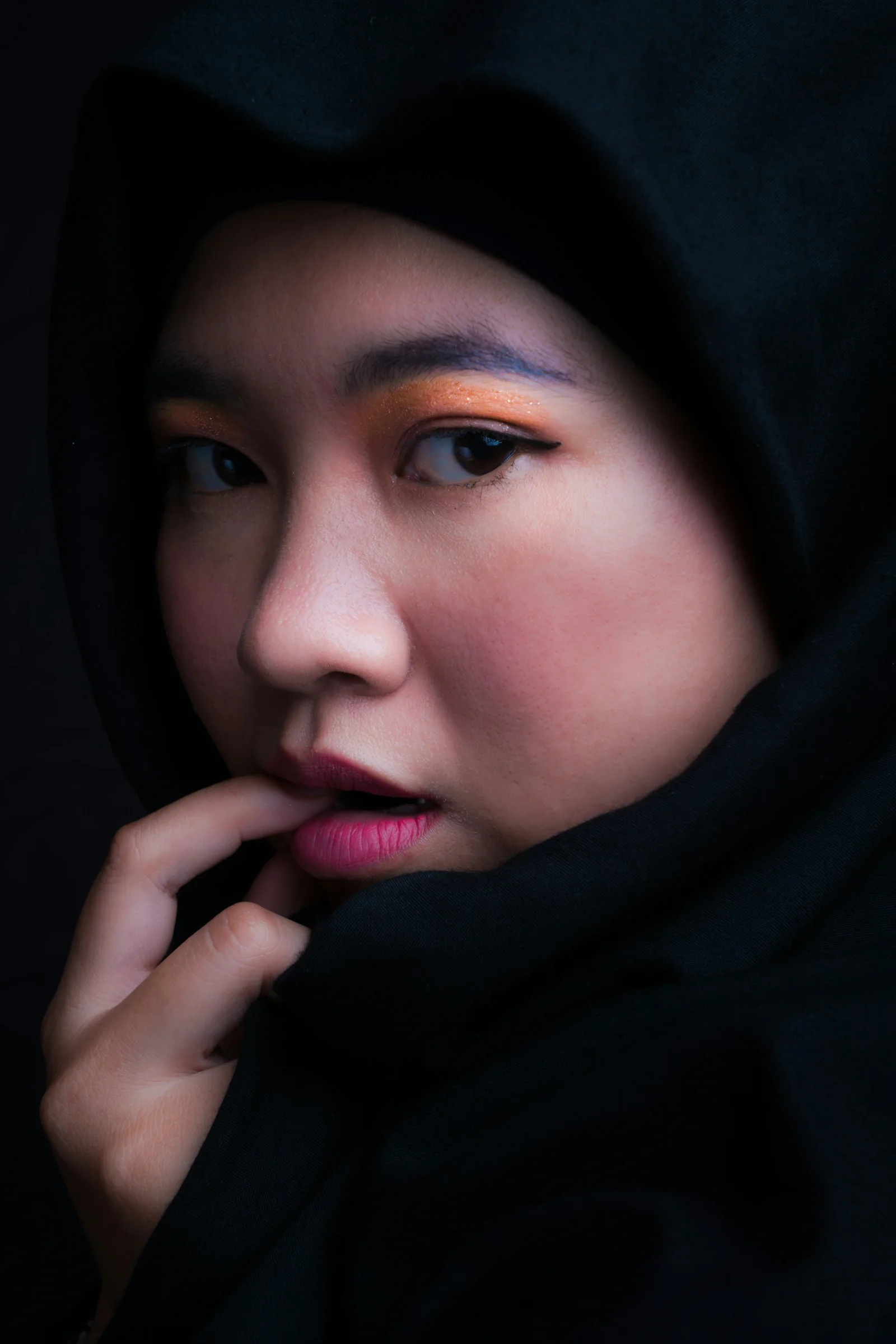 woman touching own lips