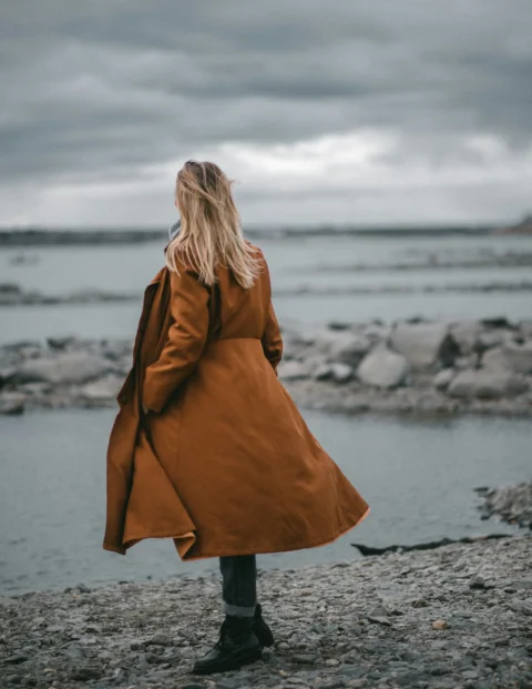 a person walking on a beach