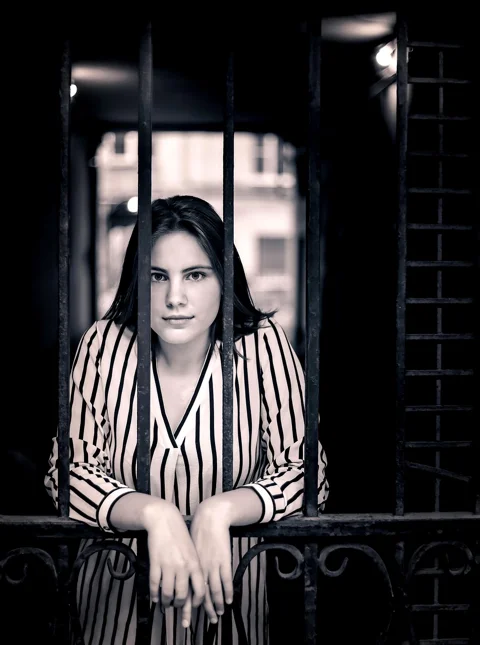 young woman, grille, black and white, model