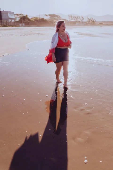a person standing on a beach