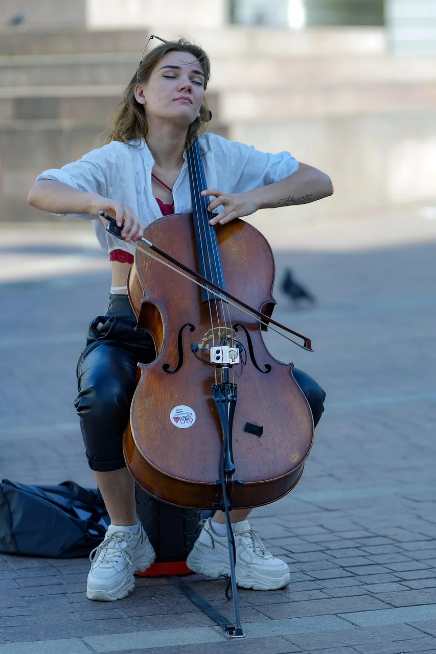 woman, cellist, busker, playing