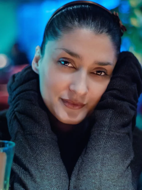 woman in gray turtleneck sweater