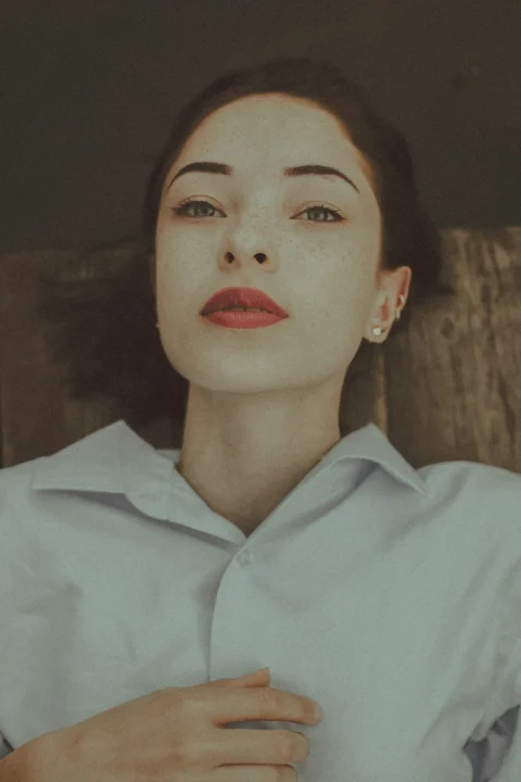 woman in white button up shirt