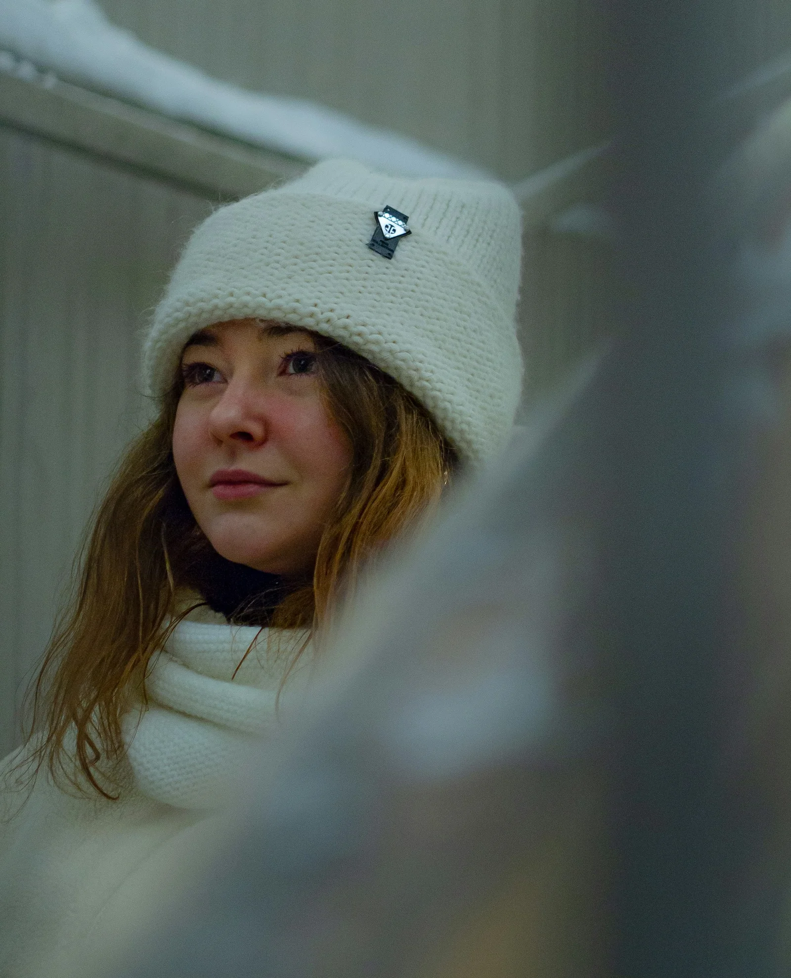 girl in white knit cap