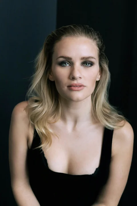 woman in black tank top