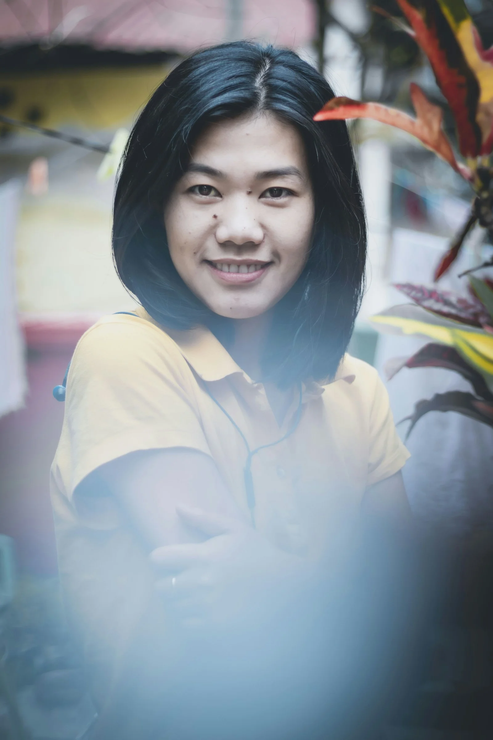 smiling woman in white button up shirt