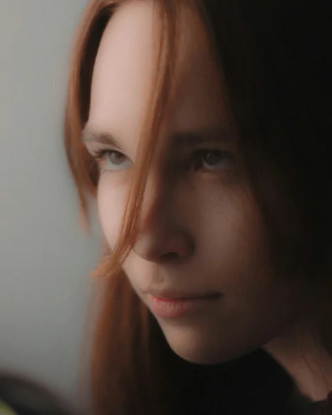a woman with brown hair