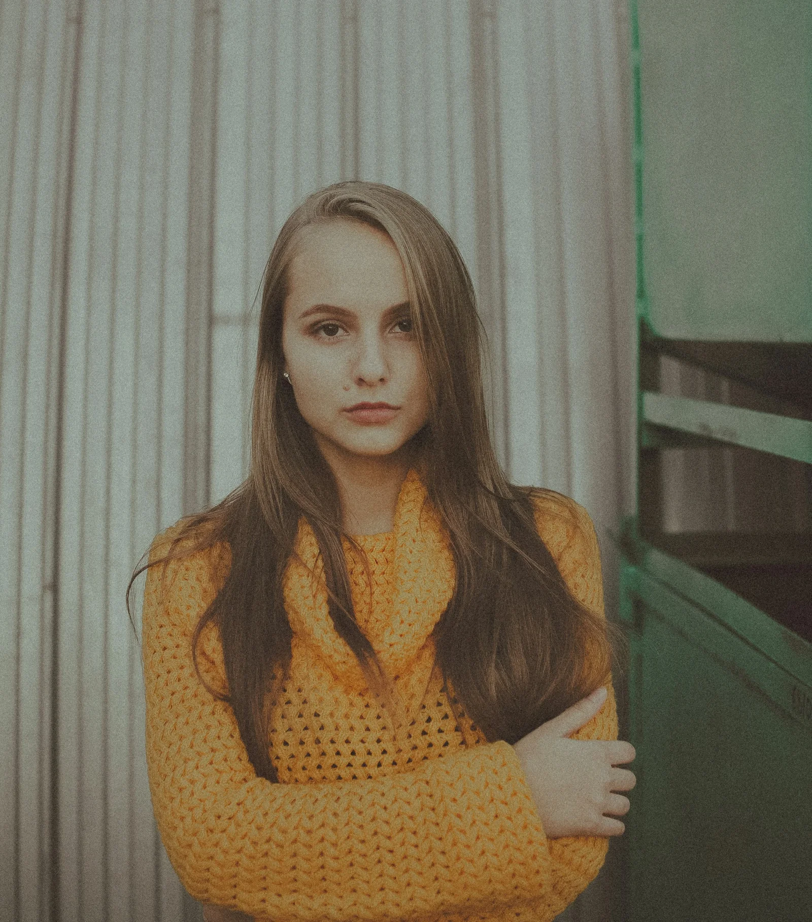 woman in orange knit sweater