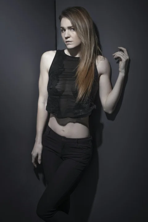 woman in black tank top and black denim jeans
