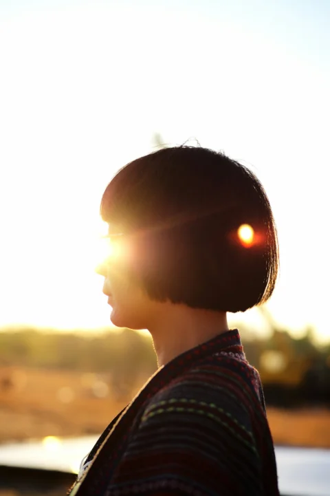 a person looking out a window