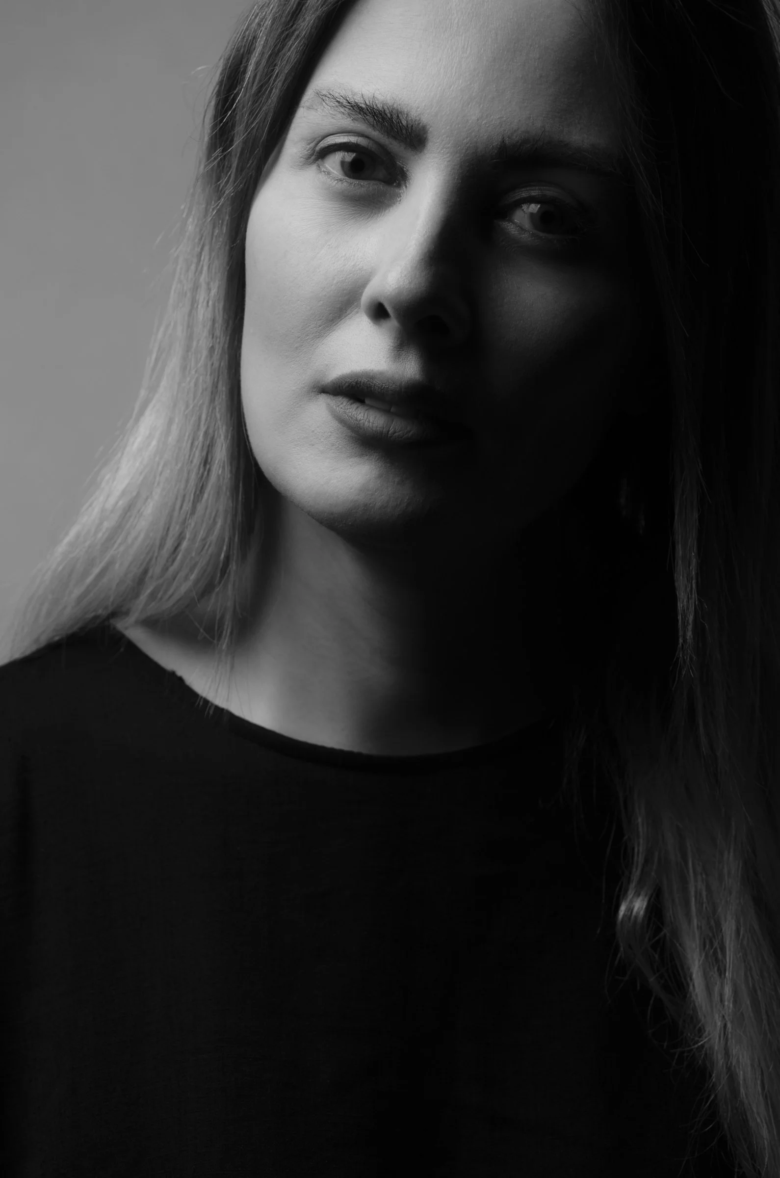 a black and white photo of a woman