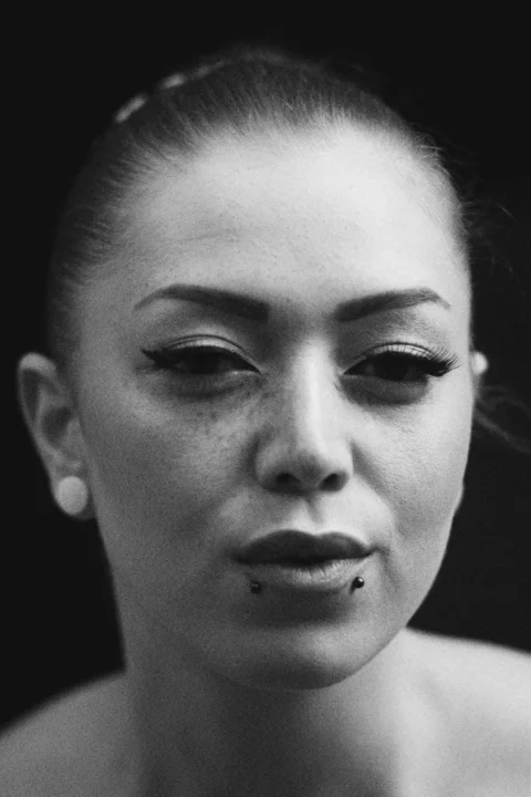 a black and white photo of a woman's face