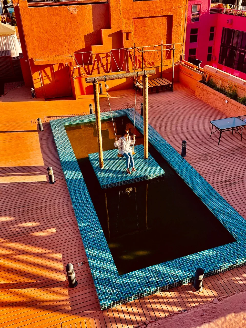 morocco, woman, swing, swimming pool